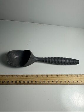 vintage aluminum ice cream scoop produced by Progressus during mid-20th century
